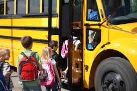 Image of students boarding a school bus